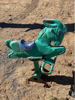 Antique cast iron spring rider