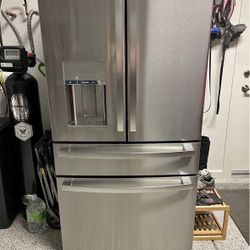 Premium GE Stainless Steel 28 cubic ft. 4 door fridge and freezer