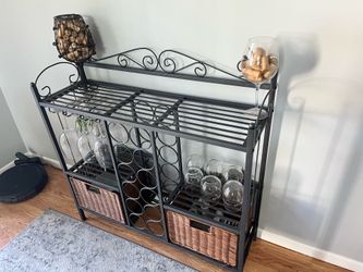 Metal wine rack with glass holders