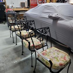 4 Wrought Iron Chairs With Cushions. 