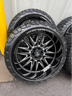 NEW 24x12 axe Offroad wheels wrapped in 285/40r24 RBP rt tires