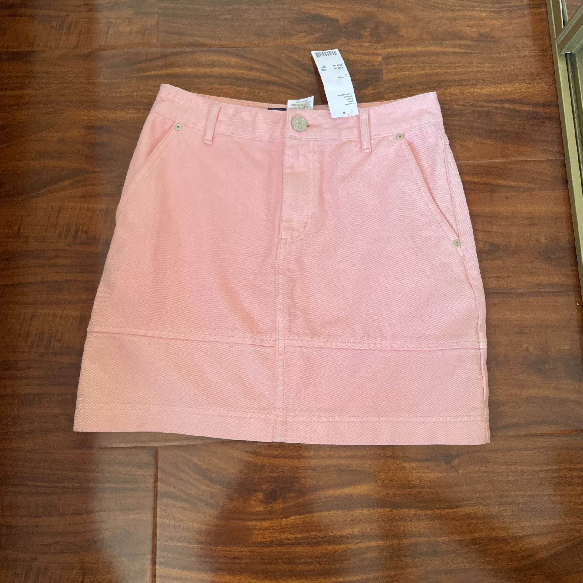 NWT women eyeye urban outfitters mini skirt .SIZE S Pockets...