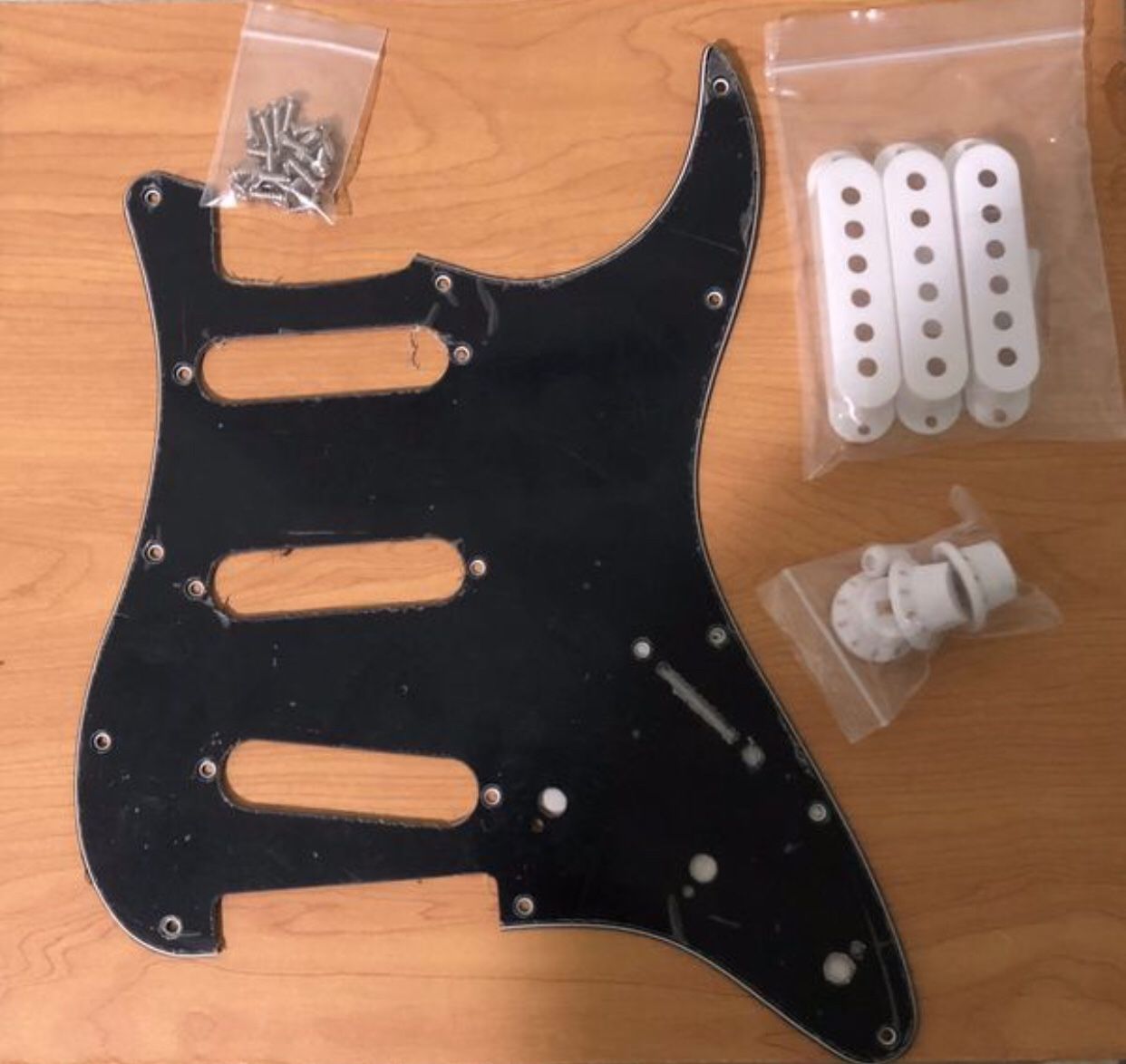 FENDER OR SQUIER STRAT GUITAR, BLACK PICKGUARD 11 HOLE with 11 Silver or Black Screws and White Plastic 3 Pickup Covers / 3 Knobs / Switch Tip, Bass
