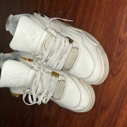 Jordan 4 Metallic Gold 
