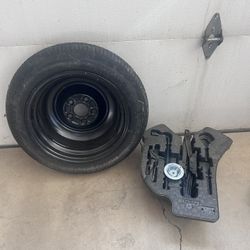 Spare Tire And Jack Stand 
