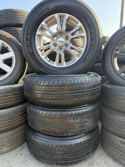 18” Ford f-150 6x135 with 265-70-18 Dunlop tires.