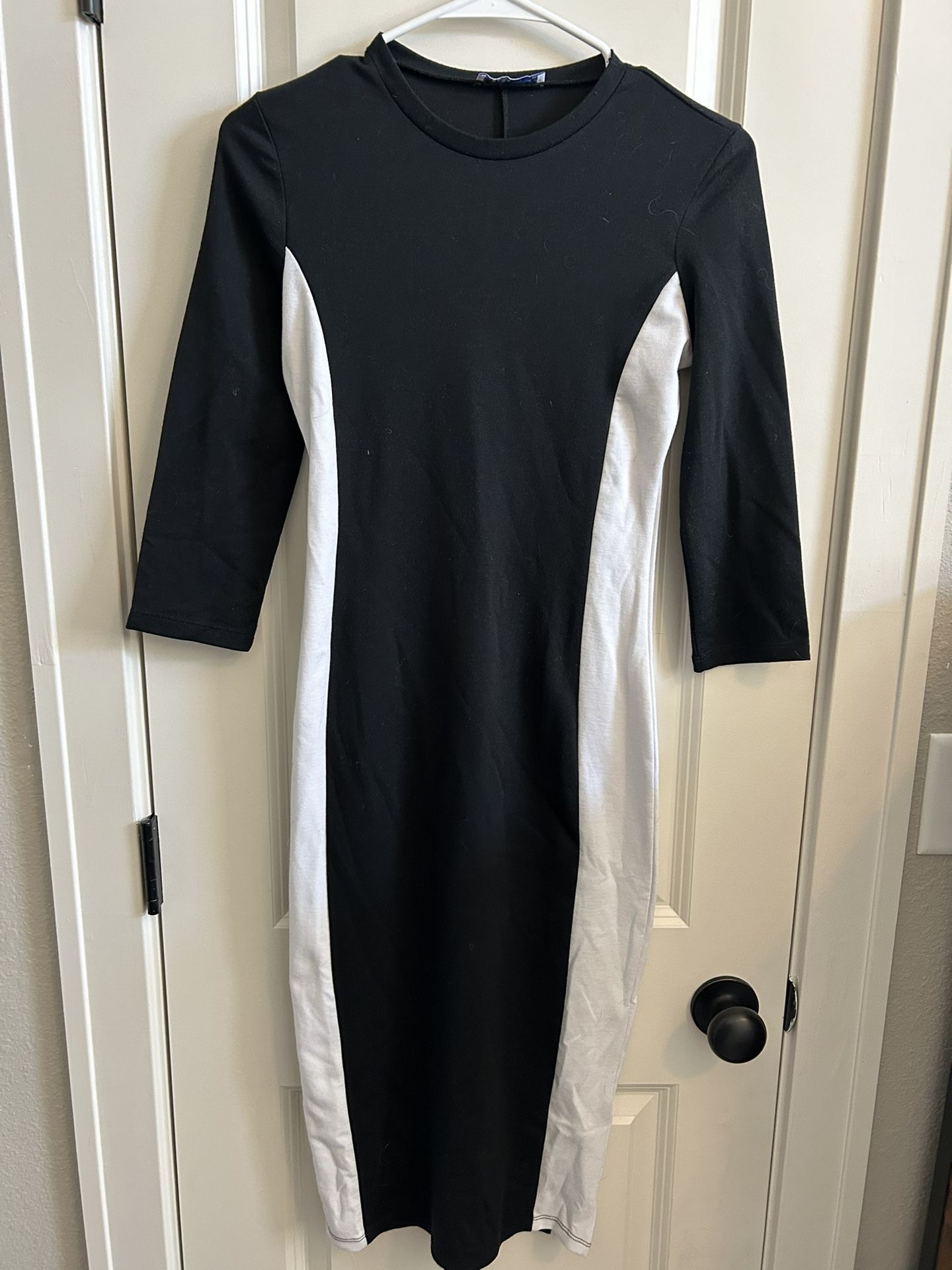 Woman’s black and white Zara midi dress. Size small.