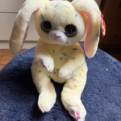 Ty Beanie Bellies "Spring" plush bunny, identified by its pale yellow fur with confetti spots and large glittery eyes With tag  Smoke free home