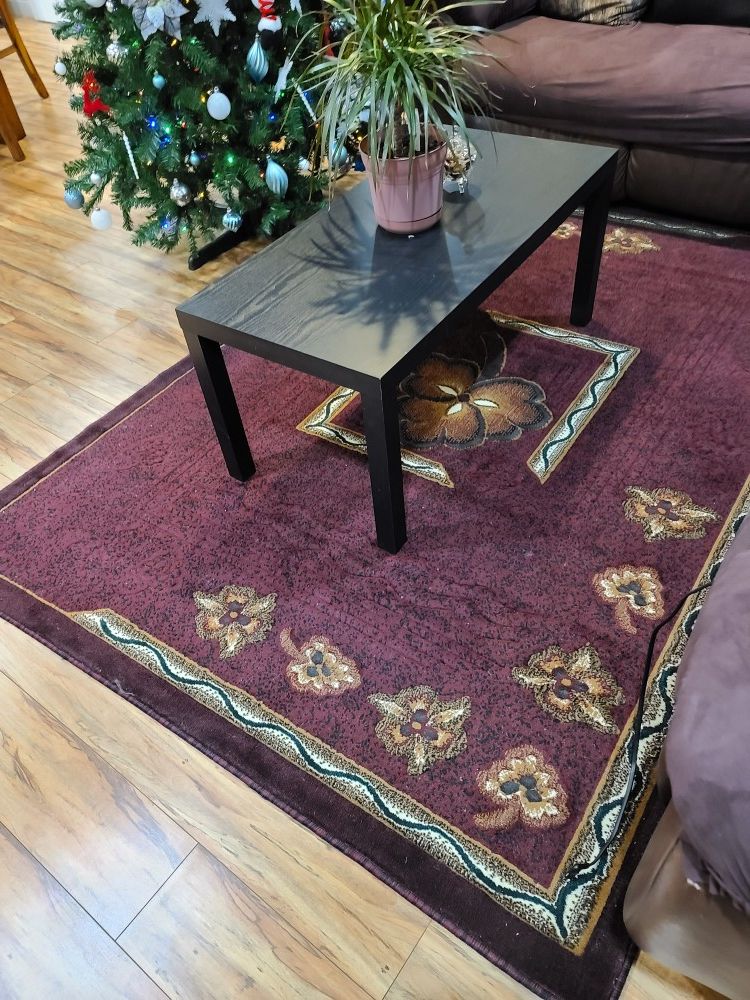 Coffee table and carpet.