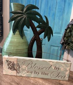 New Vase  18”H x9” $8, Metal Palm Tree 18.5”H x14” $8, Wood Plaque 16”x 5” $8. Pick up in Palm Bay  