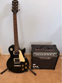 Epiphone LP 100 Les Paul Guitar with amp and stand