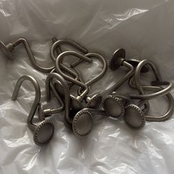 Brushed silver shower curtain hooks