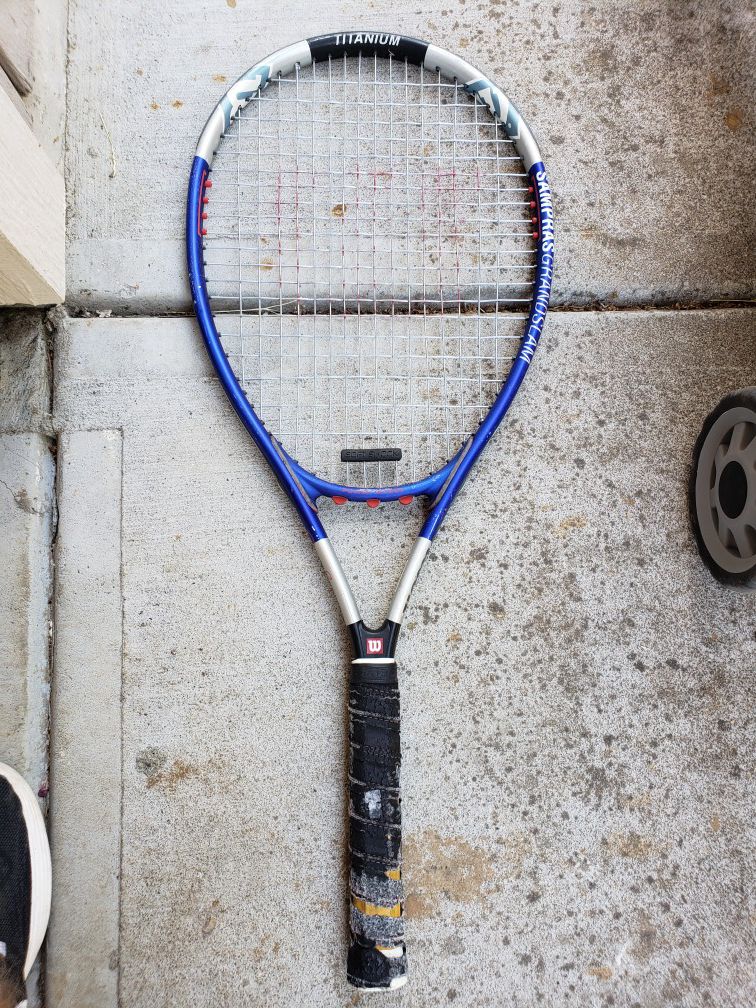 Wilson tennis racket used. See pics