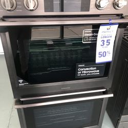 doble oven sansung30” in wide and 50 high convenction microwave  both  NEW 