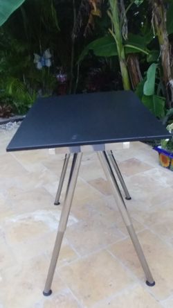 Table / Black & Silver 32"w x47"L With Ajustable legs go Up & Down