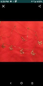 10k.gold. butterfly charm necklace.