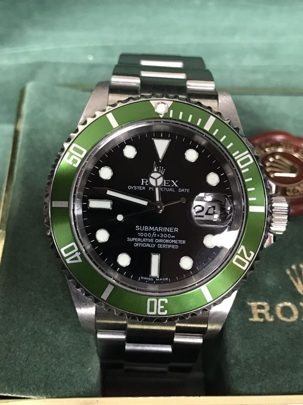 used rolex submariner green bezel