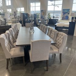 15 Piece  dining room set . Includes: 1 dining table &14 side chairs.