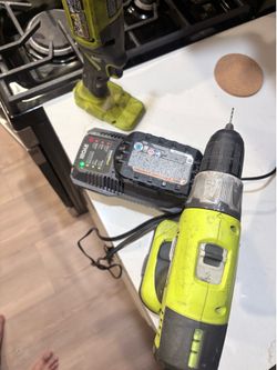 Ryobi drill and grinder with charger and batteries