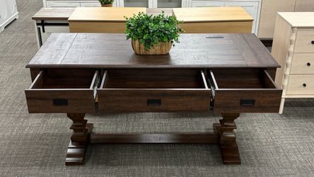 59” Farmhouse Executive Desk with a rich dark brown wood finish, 3 spacious drawers, built-in charging station, and sturdy pedestal-style legs. Large