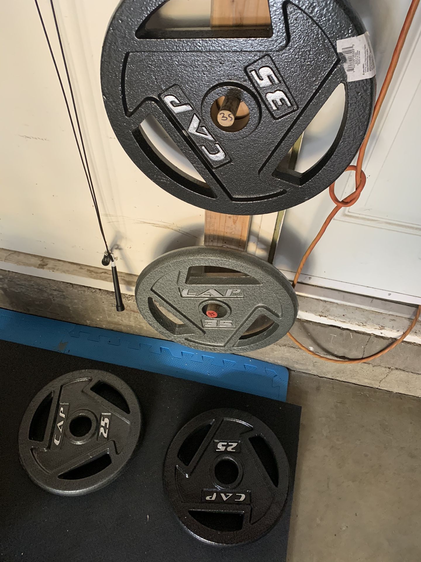 pair of cap barbell 35lb and 25lb olympic weights. 120lb total