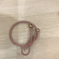 Soft, feminine pink hair tie for girls