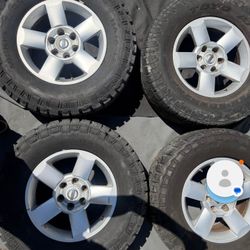 Nissan Titan 18 Inch OEM Rims And Mickey Thomson Tires 6x139.7mm Or 6x5.5 Inch Lug Pattern 
