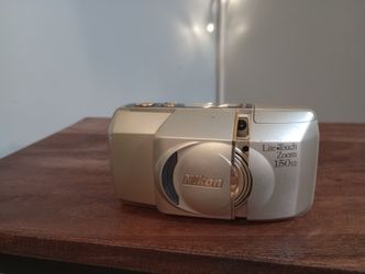 Nikon  LITE  TOUCH