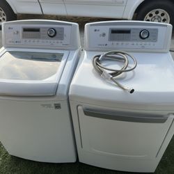 LG Top Load Washer And Electric Dryer 