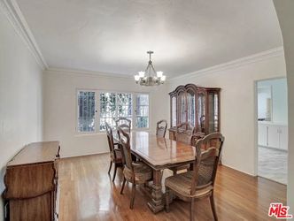 9-piece mid-century walnut dining room set (Estate Quality)