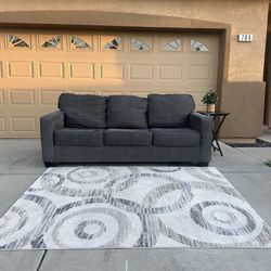 Can Deliver Ashley Dark Gray Couch