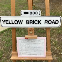 YELLOW BRICK ROAD sign