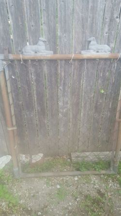 Antique gate with dogs