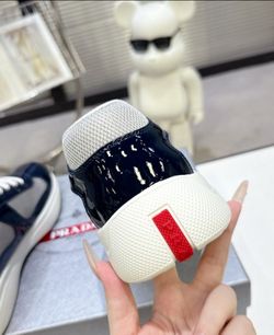 Black and white prada cups
