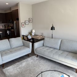 Living Spaces, Ginger Grey Fabric 79" Sofa and Ginger Grey Fabric 59" Loveseat