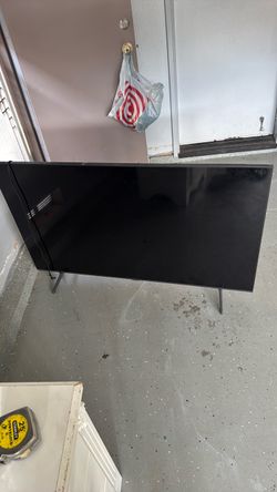 Large Flat Screen TV with Stand