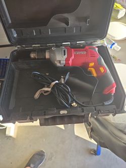 Slightly Used Half Inch Drill Motor, Drill Bits, and Case