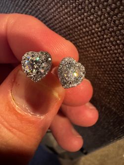 Beautiful brand new sterling silver moissanite stud earrings in a unique flower-style setting. These earrings have incredible sparkle and shine and lo