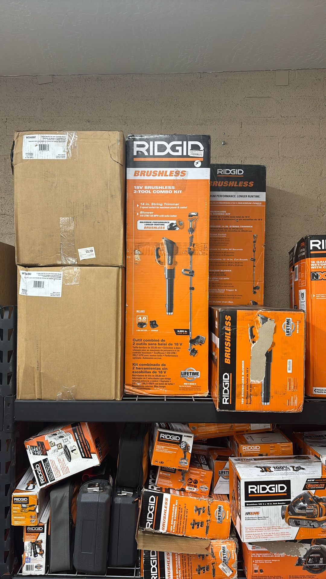 Ridgid 18V Brushless 14 in. Cordless Battery String Trimmer and Leaf Blower 2-Tool Combo Kit with 4.0 Ah Battery and Charger