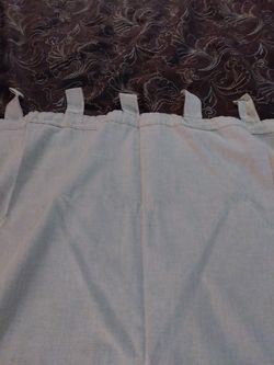 Beige tab top curtains