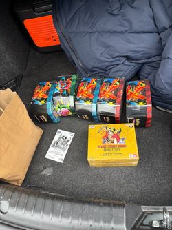 Ascended heroes tins
