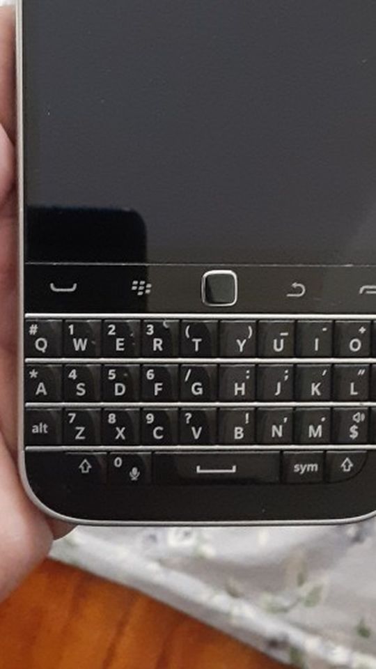 Blackberry Classic at&t refurbished some scratches and scuffs coming  phone may be different than pic almost but same condition .