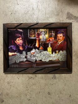 small posters with wooden frames