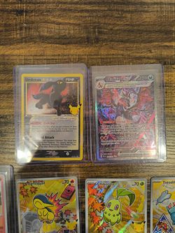 Paldean Charizard and celebrations umbreon
