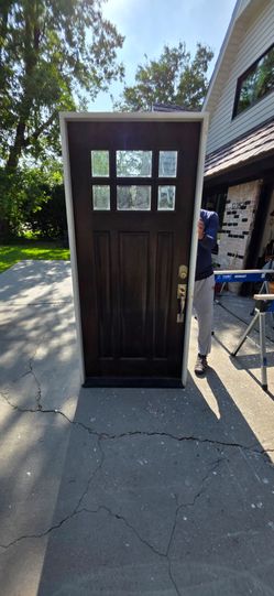 36x80 front door solid core very heavy, Left swing , framed.