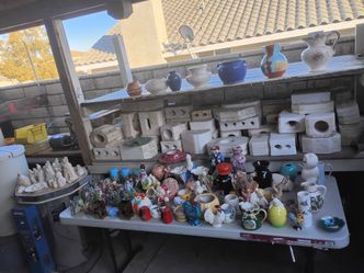 Full pottery set with kiln, motor, molds, and ceramics
