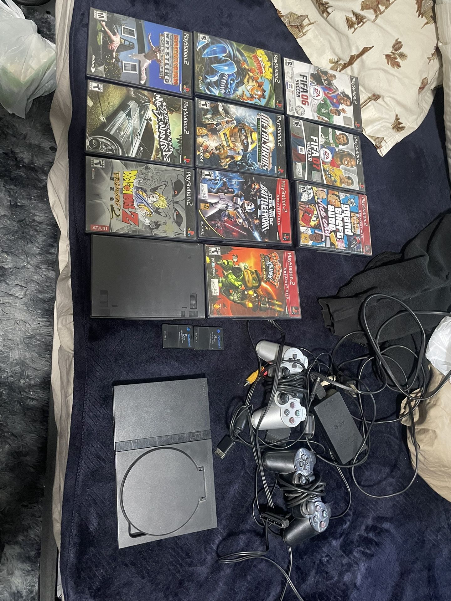PS2 Slim W/ Games