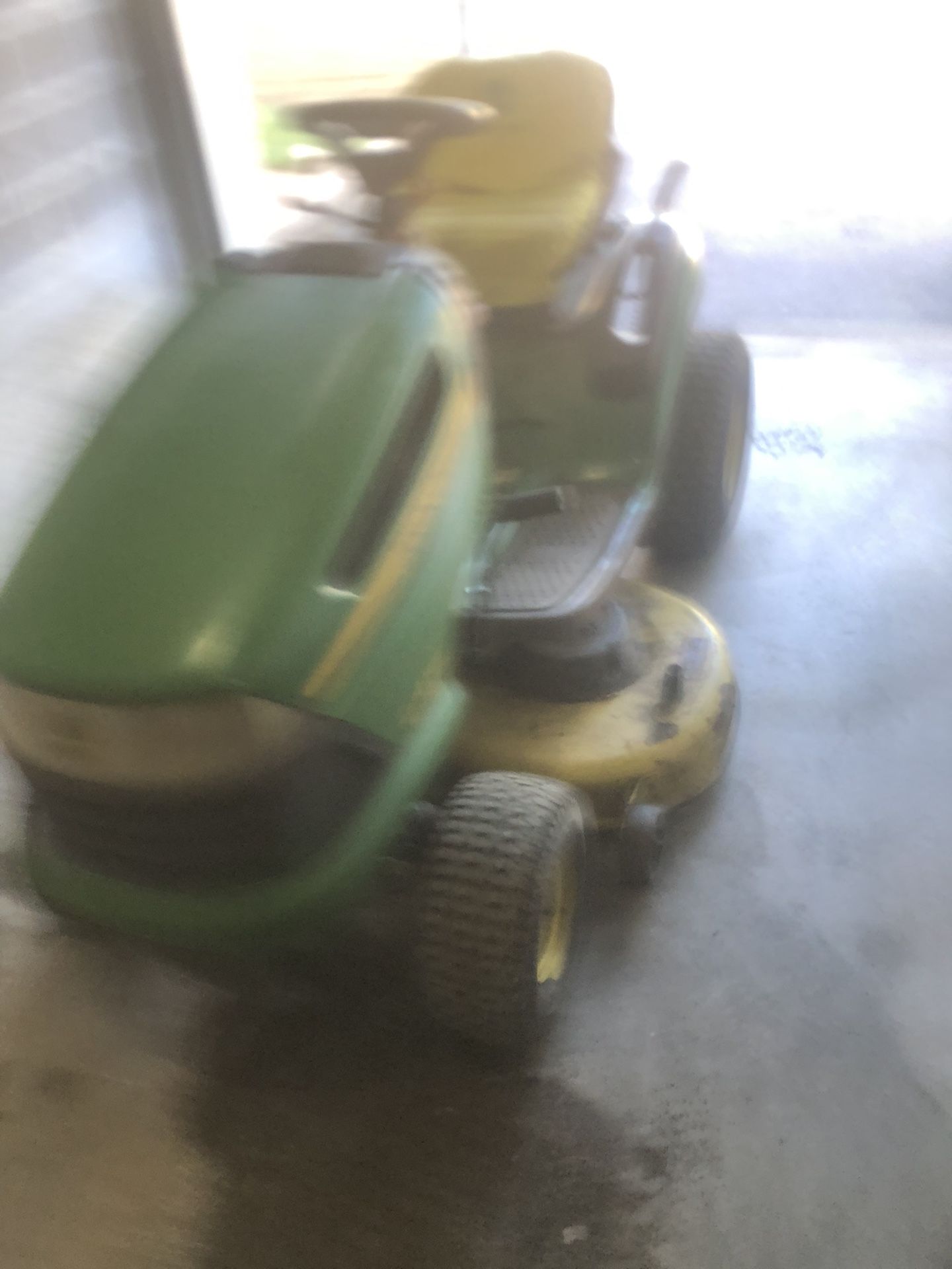 John Deere riding mower