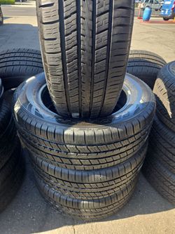 Set of four used tires 235/60-18