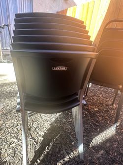 Stackable black Lifetime chairs